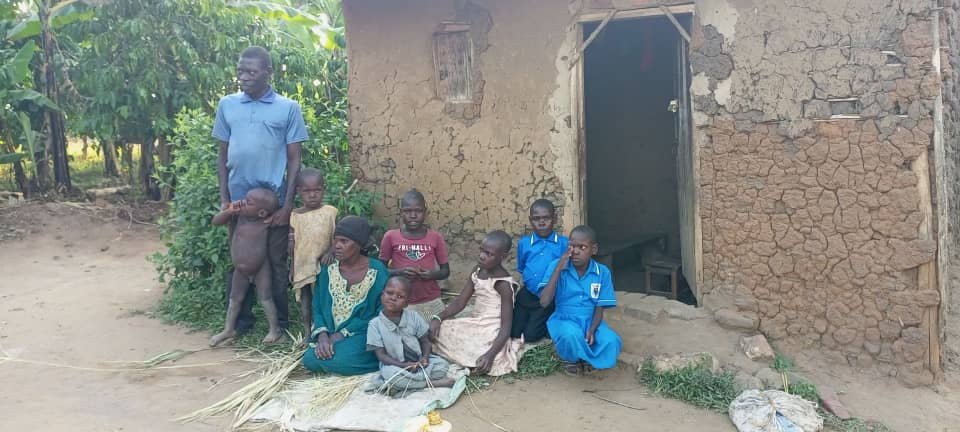 Elderly person in Uganda receiving care and support from Amirah Charity Foundation team