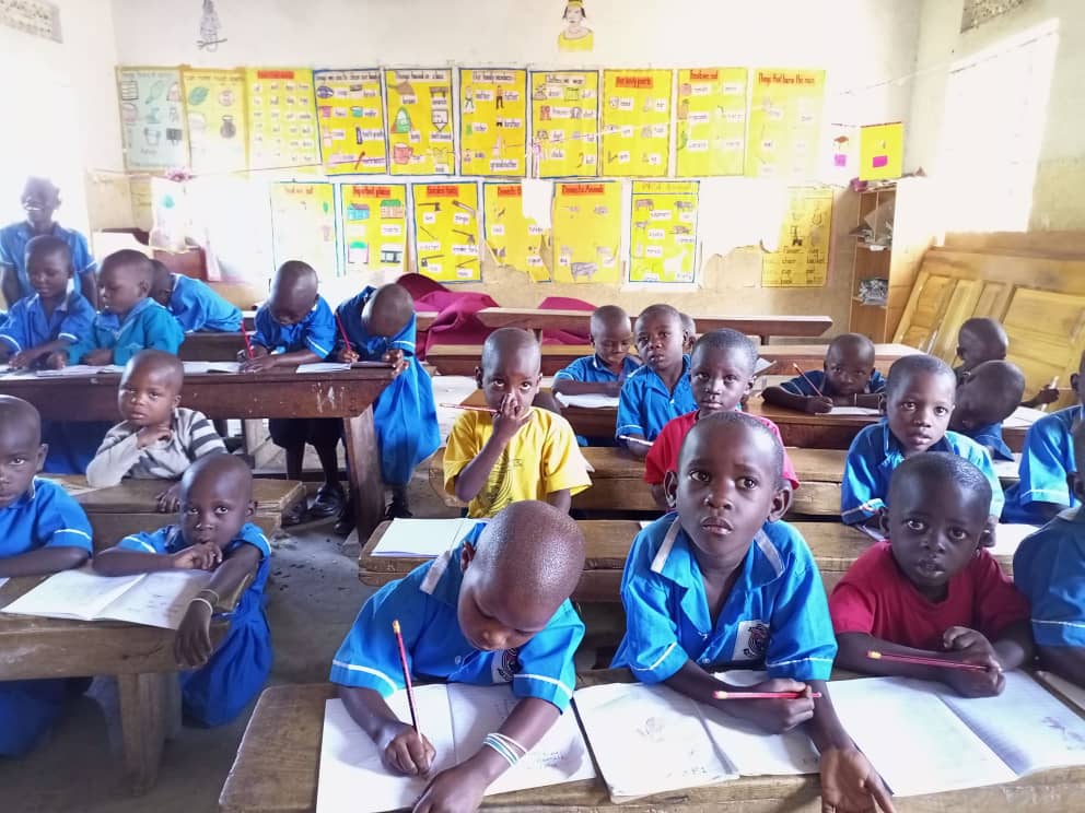 Amirah Charity Foundation Uganda team working with children in a community setting